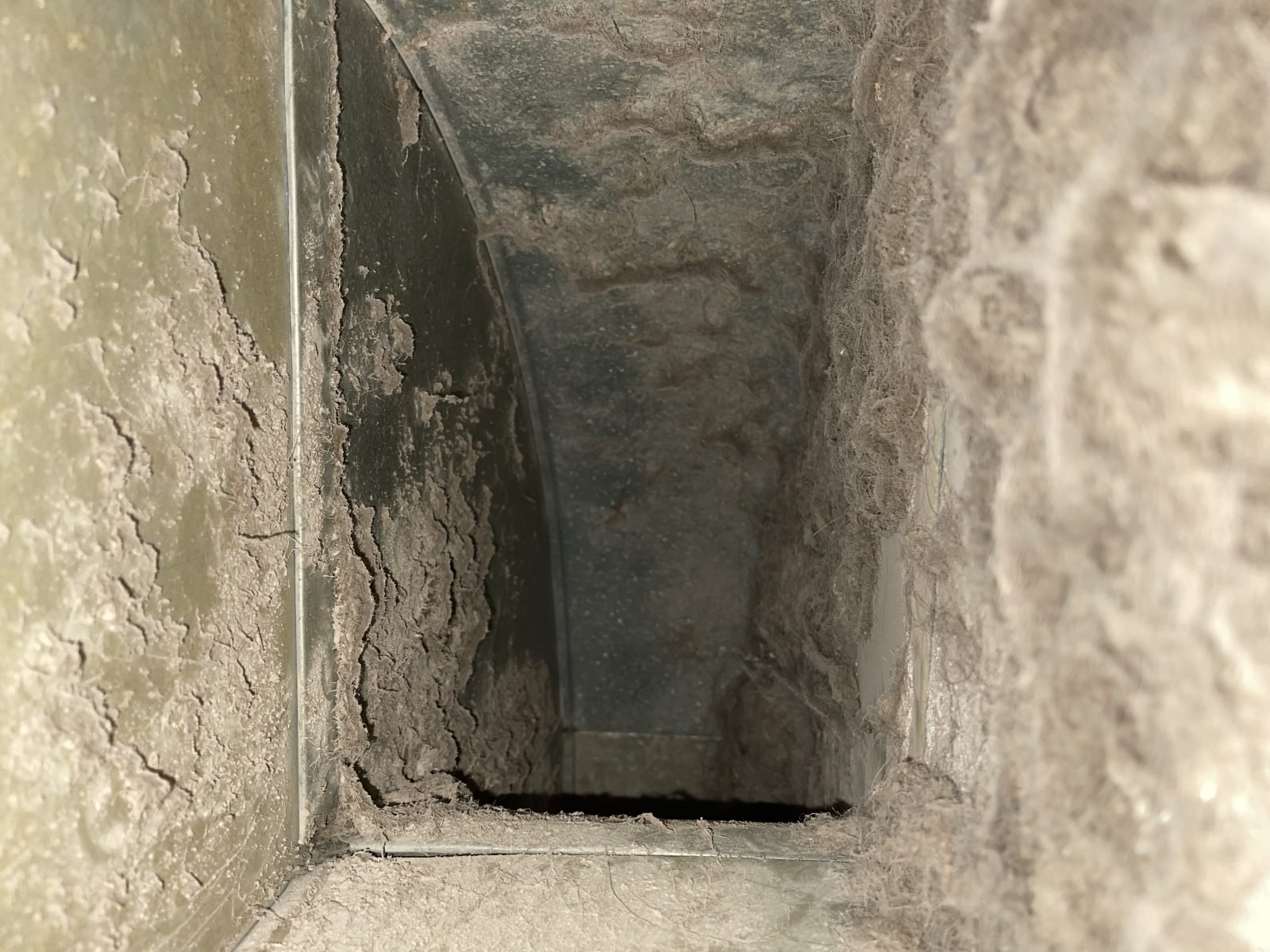 Duct interior before cleaning in Mississauga, heavy dust buildup