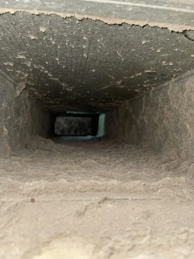 Heavily caked duct interior lining