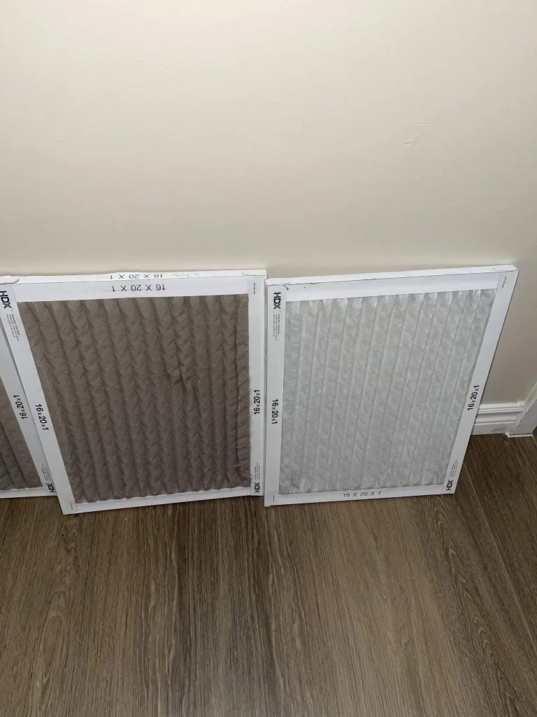Two identical 16x20x1 filters side by side — one clean white, one grey with months of trapped dust — from the same home.