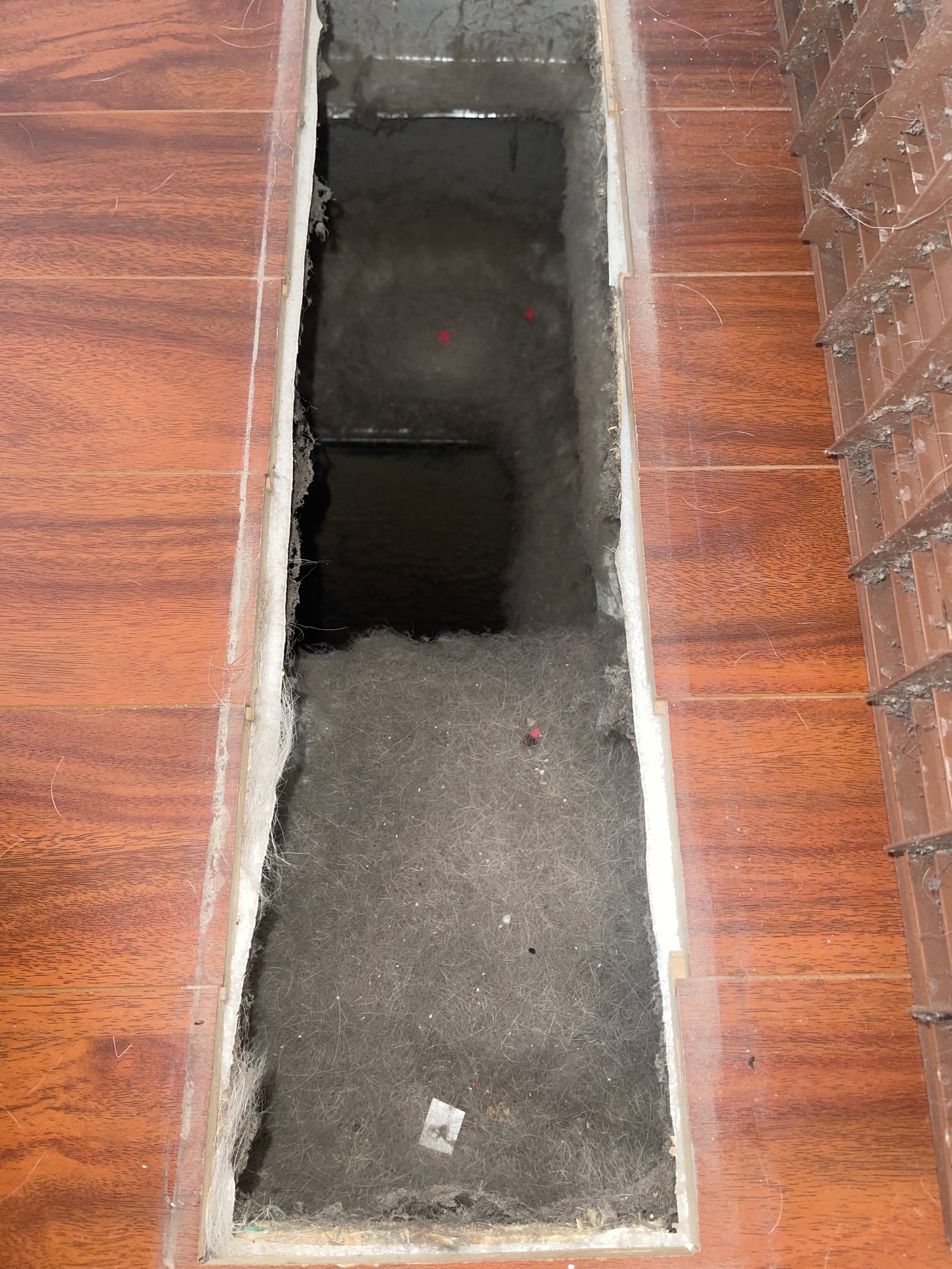 Air duct before professional cleaning
